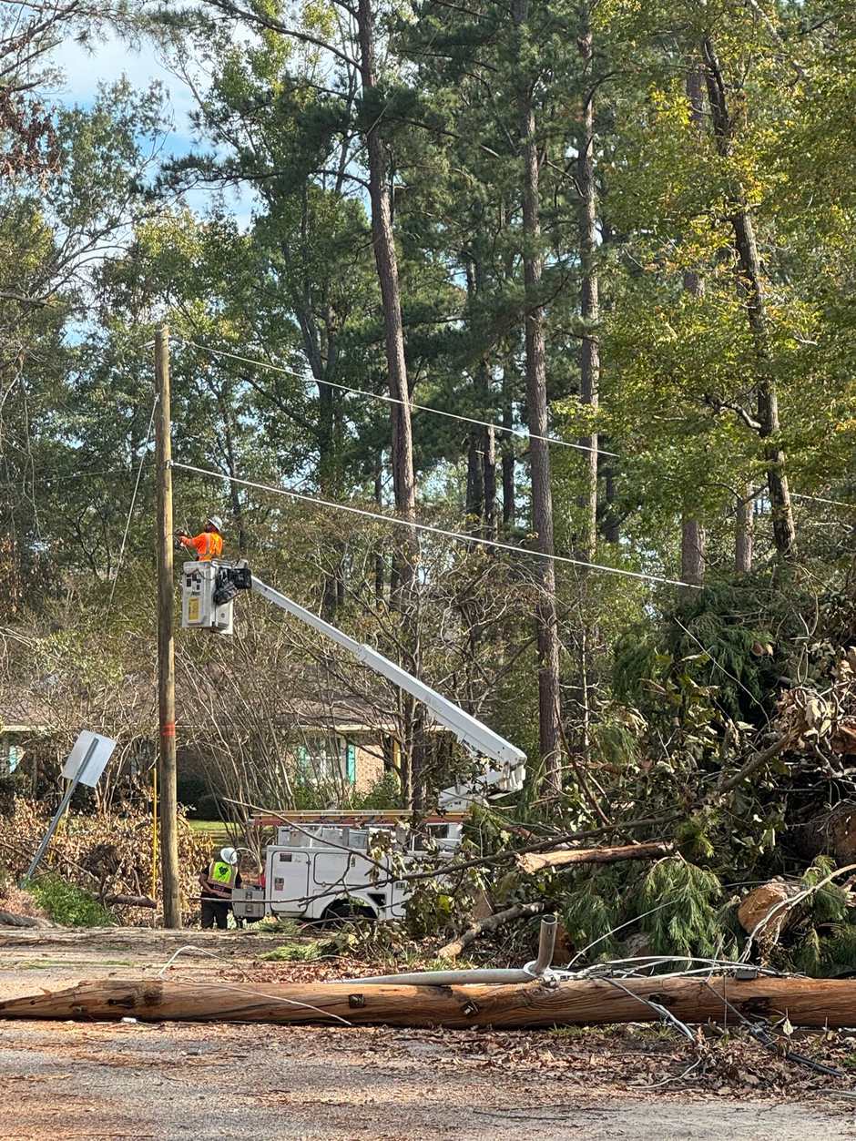 Clearing wreckage and rebuilding aerial lines